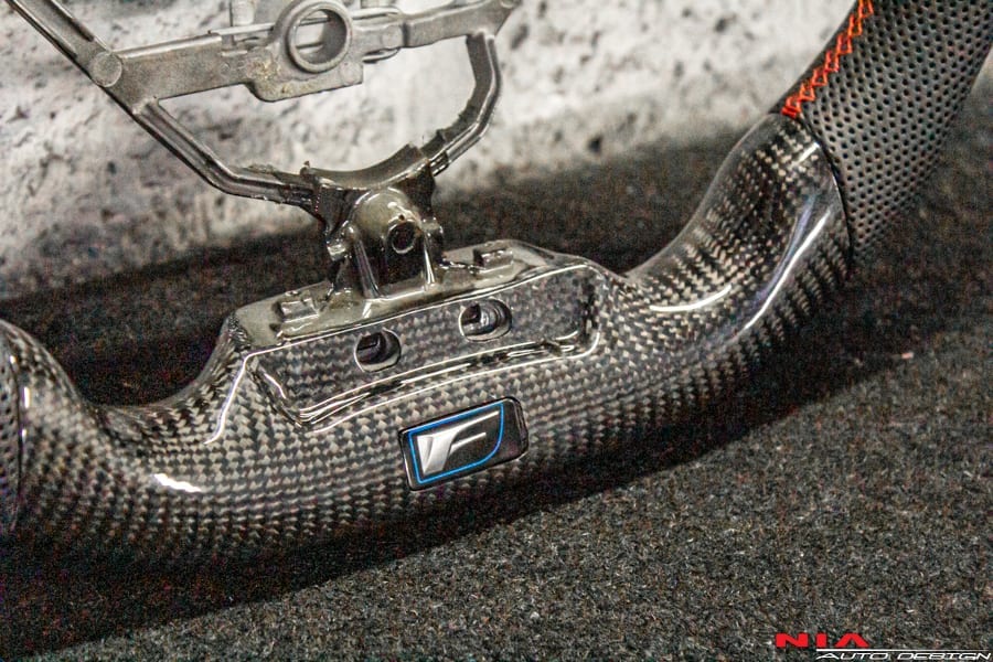 NIA Auto Design's carbon fiber steering wheel is made from a genuine 2x2 twill weave carbon fiber. Made for Lexus RCF. The steering wheel is Made out of an F Performance oem wheel, for perfect fitment. The comfort of a quality steering wheel can improve the drive-ability of your car while on the street or while racing on the track.