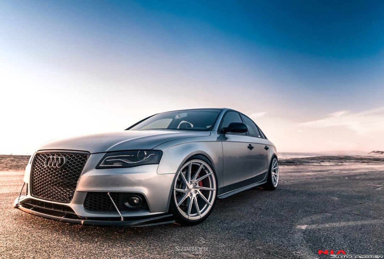 Nia Body Kits upgrades your Audi A4 an aggressive stance without altering with the factory design with the 2006-2010 A4 NIA Front Splitter. Made to fit the B8 and B8.5 (2009-2016).  Contact us at www.niaautodesign.com