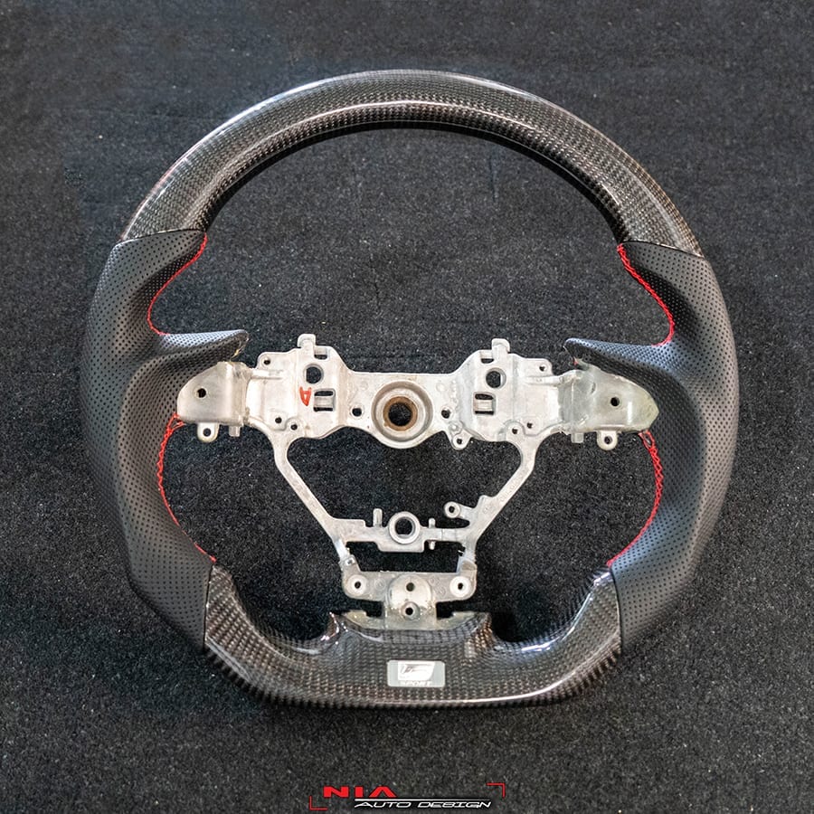 NIA Auto Design's carbon fiber steering wheel is made from a genuine 2x2 twill weave carbon fiber. Made for Lexus F-sport and base models of the Lexus GS 2016 - 2022. The steering wheel is Made out of an fsport oem wheel, for perfect fitment. The comfort of a quality steering wheel can improve the drive-ability of your car while on the street or while racing on the track.